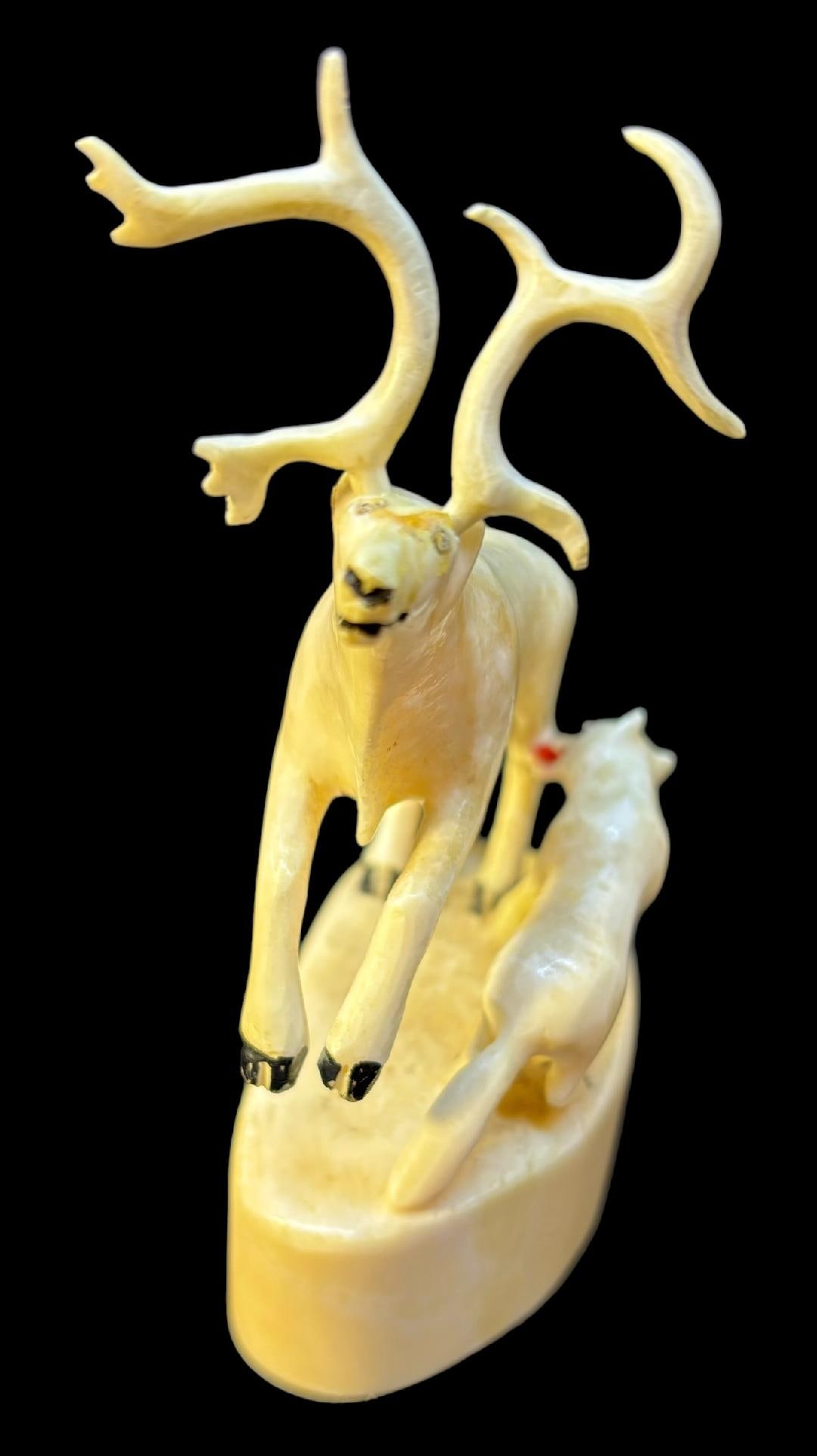 Vintage Alaskan Hand Carved from Walrus Tusk Caribou Figure Early 1900s: Vintage Alaskan hand carved figure of a caribou being attacked by a wolf. Carved from bone or tusk. Measures 5" x 3". Antlers can be removed from caribou. Domestic shipping $12.