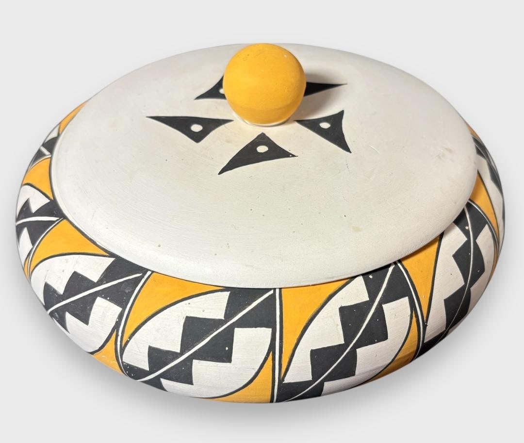 Vintage Acoma Pueblo Lidded Pot Yellow: Vintage Native American Acoma Pueblo lidded bowl. Yellow accent is unusual. Measures 9" x 4" with lid. Unsigned. Domestic shipping $16