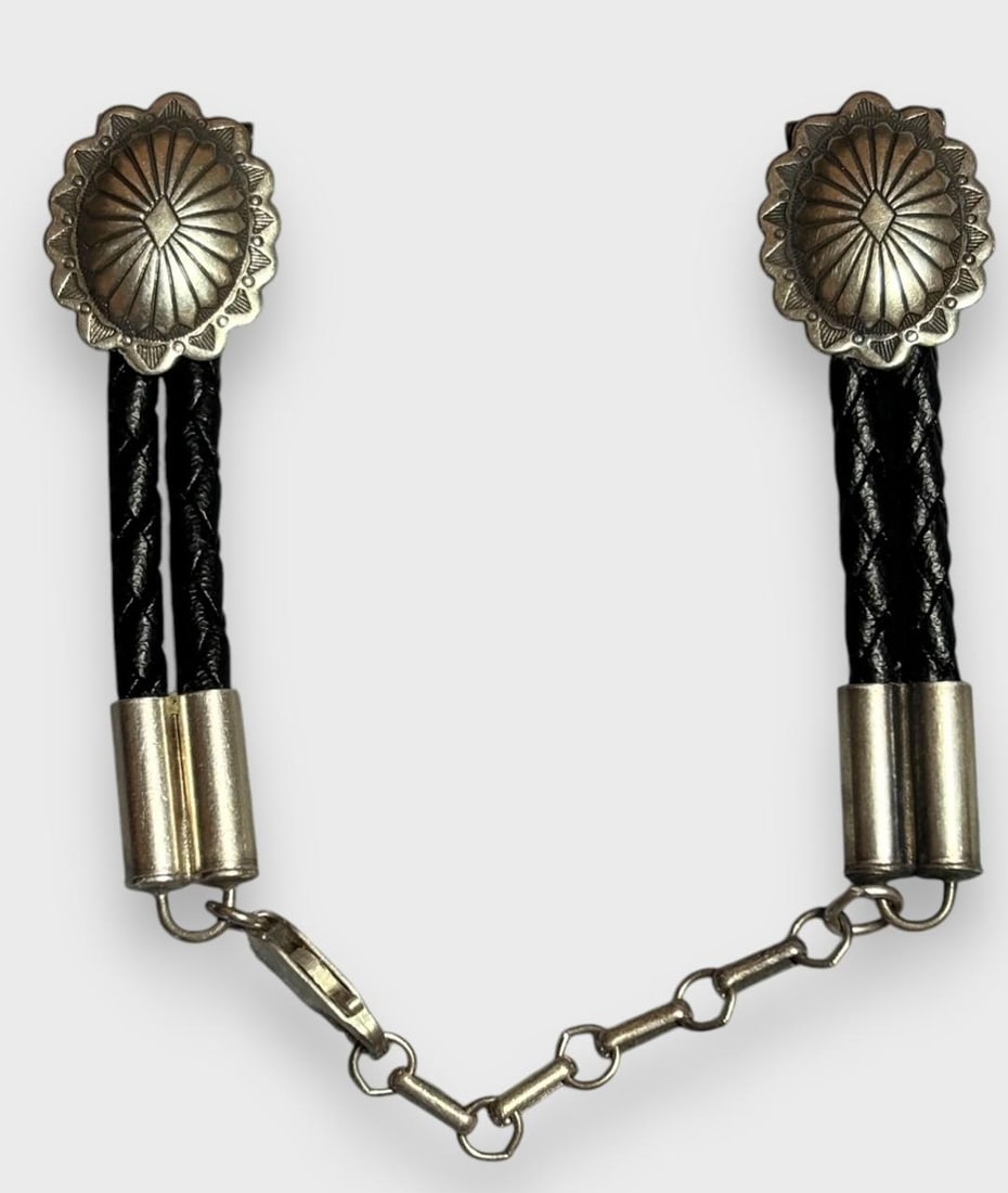 Navajo Sterling Concho Watch Band: Native American Navajo sterling watch band with leather cord strap. Sterling conchos. 3/4" x 5/8" Domestic shipping $6