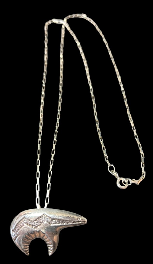Native American Navajo Sterling Pendant Necklace Signed AM: Native American Navajo sterling pendant/pinback necklace. Chain measures 24" and is marked .925. Bear fetish pendant is signed AM, measures 1.5" x 1" and can be used as a pendant or a pin. Total weigh