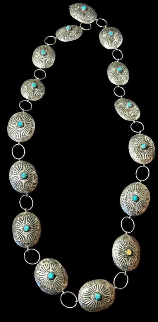 Fred Harvey Style Ladies Sterling and Turquoise Concho Belt Ca. 1970s: Fred Harvey style ladies' sterling and turquoise concho belt. Ca 1970's. Total length measures 32" with 15 conchos. Each concho measures 1" x 1.5". Domestic shipping $10.