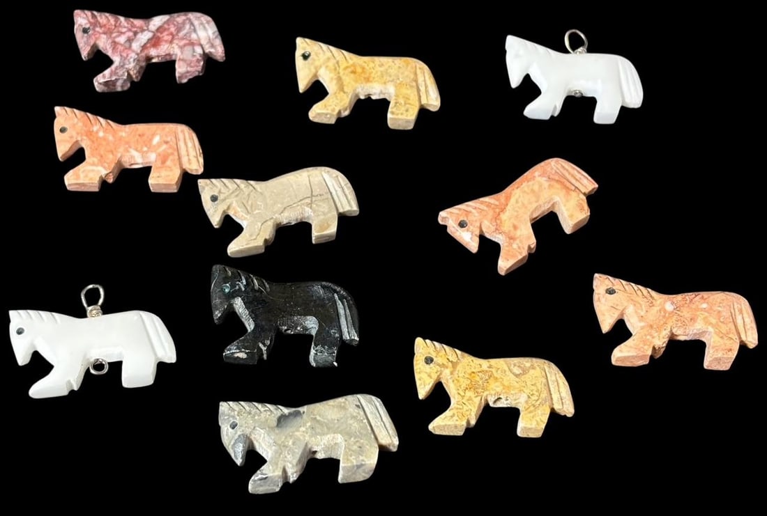 Lot of Eleven Native American Hand Carved Horse Fetishes: Lot of eleven Native American hand carved horse fetishes. Two wired for use. The others are drilled and ready to be strung or used in jewelry making. Measure 1". Domestic shipping $8.