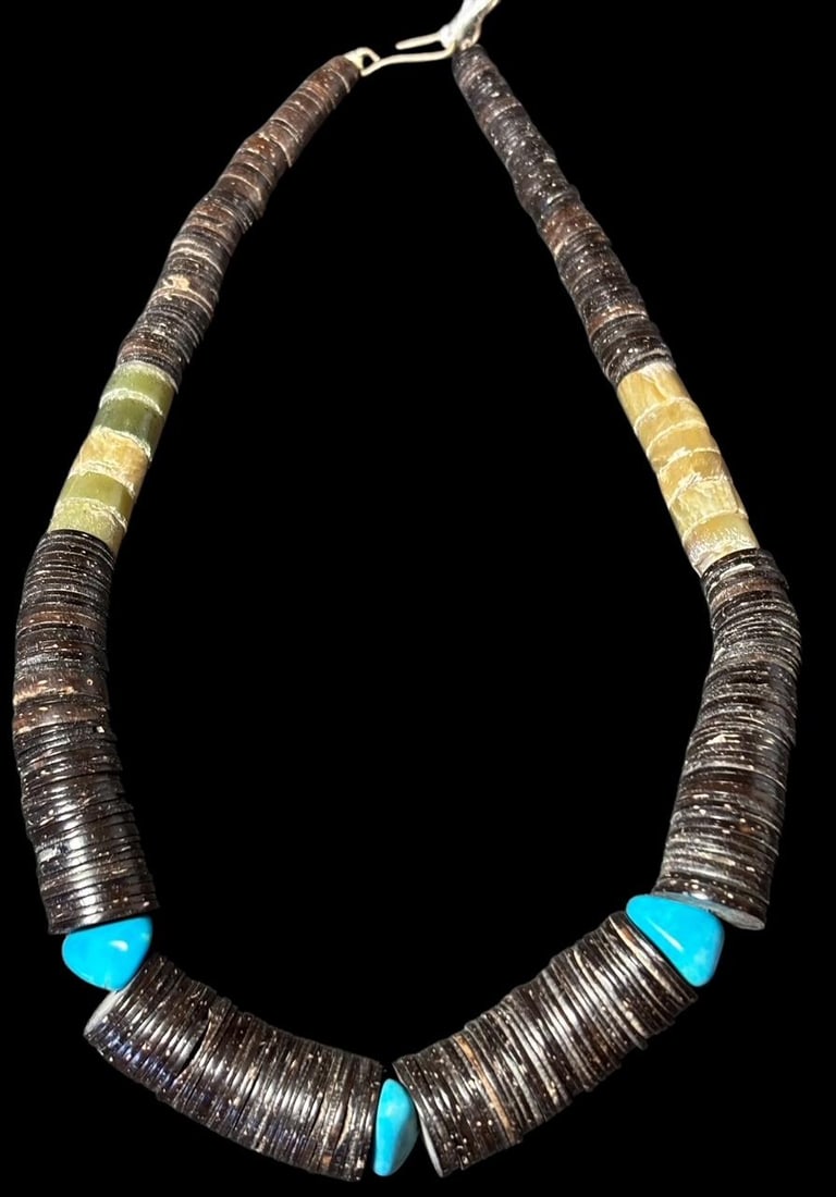 Native American Santo Domingo Pendant Necklace: Native American Santo Domingo shell and turquoise necklace. Measures 15". Domestic shipping $10.
