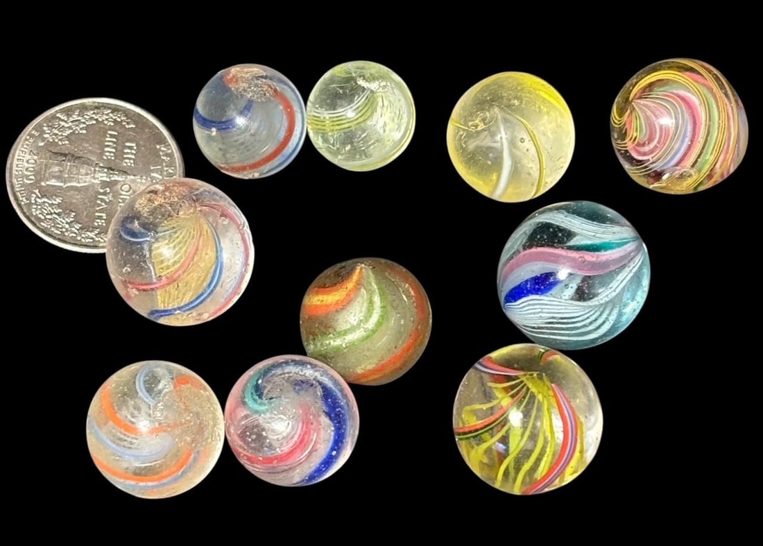 Lot of 10 Antique Swirl Marbles: Lot of 10 antique swirl marbles. Beautiful coloring. Quarter shown for size. Domestic shipping $10