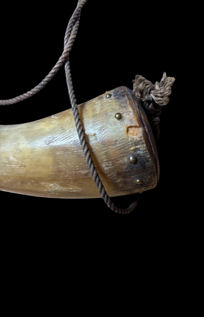 Eskimo/Inuit Powder Horn with Pellets: Eskimo/Inuit powder horn. Each end has a wooden stopper. Has pellets. Measures 7.25". For in house shipping, select "bidder arranged". Domestic shipping $10.