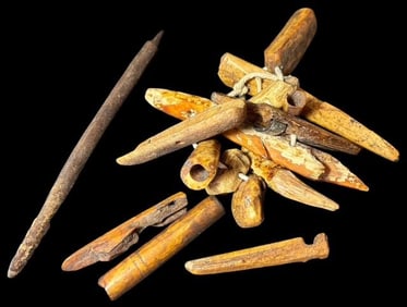 Lot of Sixteen Inuit Carved Bone, Tooth and Wood Artifacts