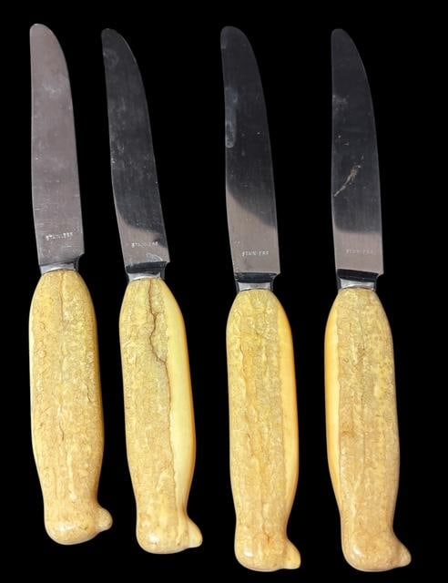 Set of Four Hand Carved Inuit Bone Handled Knives: Set of four knives. Stainless blades with hand-carved bone seal head design handles. Total length is 8.25". Nice condition. For in house shipping, select "bidder arranged". Domestic shipping $12.