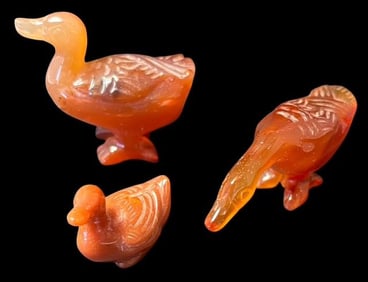 Lot of Three Hand-Carved Ducks Two Red Jade and One Stone