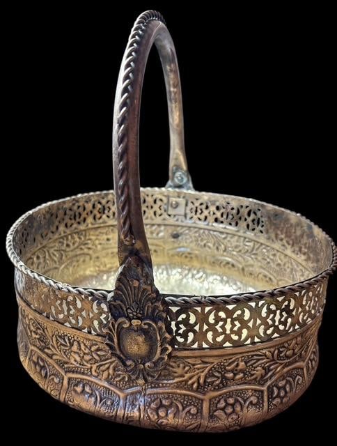 Vintage Silver Hammered Repousse Basket: Vintage silver hammered repousse basket with handle. Measures 9.5" wide by 10.5" tall to end of handle. For in-house shipping, select "bidder arranged". Domestic shipping $16.