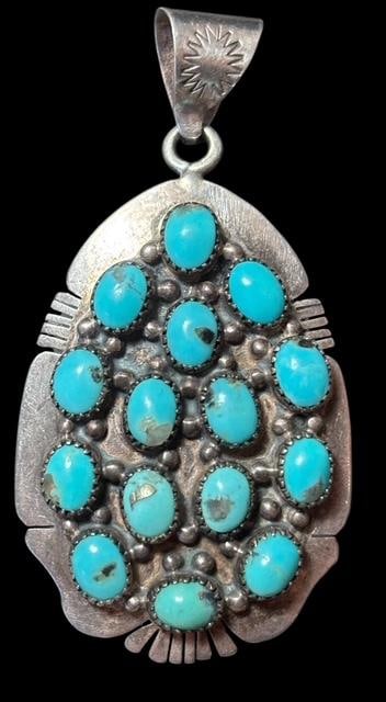 Native American Navajo Signed WR Sterling and Turquoise Pendant: Navajo Robins Egg Turquoise Pendant set in marked sterling. Signed "WR". Measures 2.5". For in-house shipping, select "bidder arranged". Domestic shipping $8.