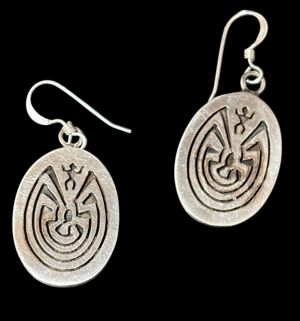 Native American Navajo Signed C. Peterson Sterling Pierced Earrings: Native American signed sterling earrings. "Man in the Maze". Signed C. Peterson. Measures 1" x .5". For in-house shipping, select "bidder arranged". Domestic shipping $6.