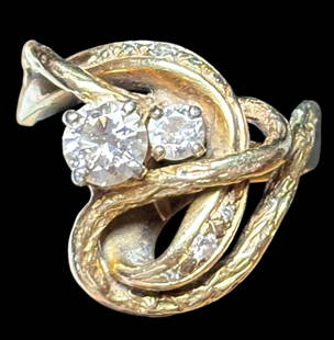 14K Gold and Diamond Ring serpent snake design custom made: 14k gold and diamond ring. Design includes 1 larger diamond, a smaller diamond and diamond chips. Size 8. Total Weight 6.6g. For in-house shipping, select "bidder arranged". Domestic shipping $12.