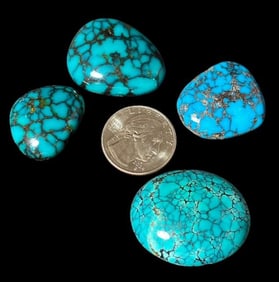 Lot of Four Turquoise Cabs