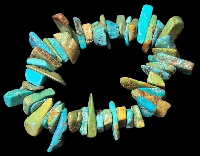 Multi-MineTurquoise Bracelet: Assorted turquoise chunks on an elastic bracelet. Turquoise comes from numerous mines. For in-house shipping, select "bidder arranged". Domestic shipping $8.