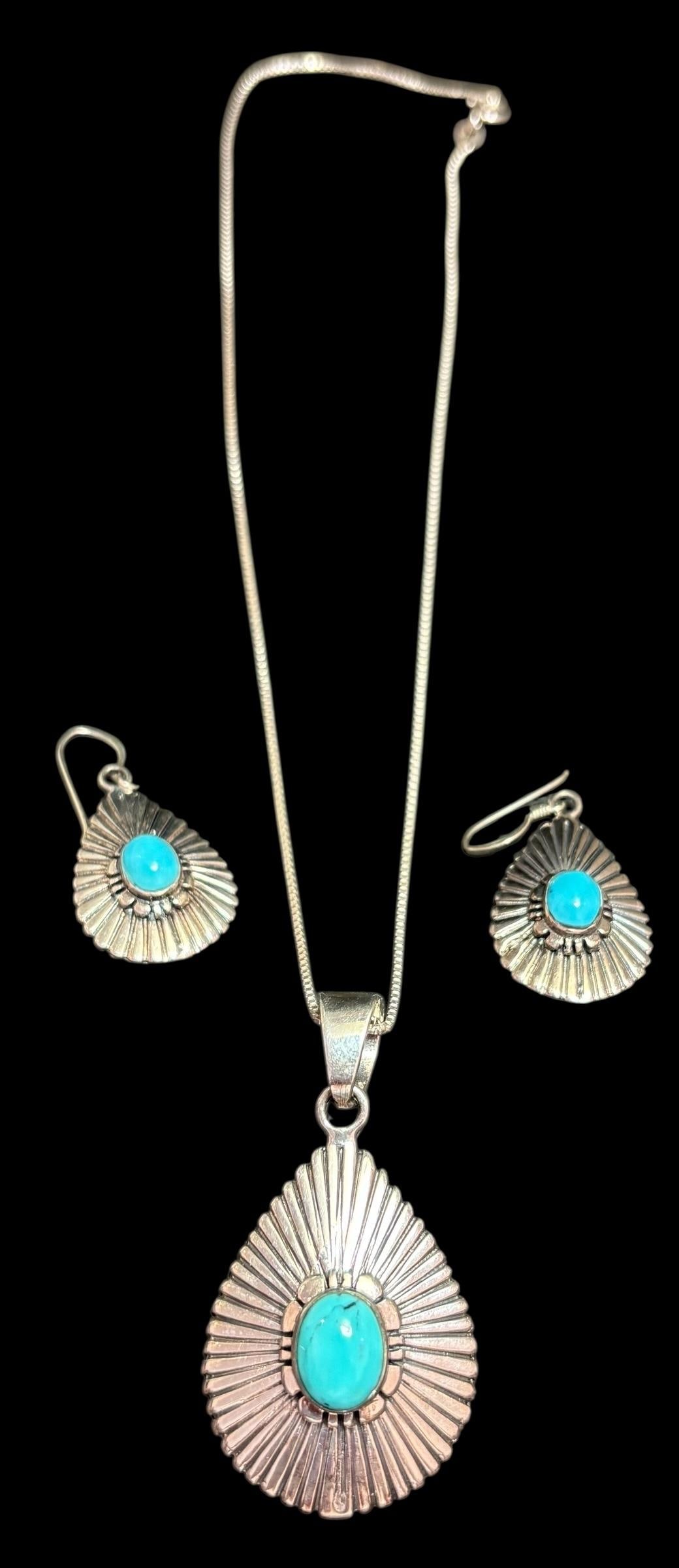 Native American Navajo Sterling and Turquoise Necklace and Earring Set Hallmark Signed: Native American Navajo sterling and turquoise pendant necklace and earring set. Marked sterling and hallmark signed. Hallmark signature features a half rising sun at horizon. Italian chain measures 15