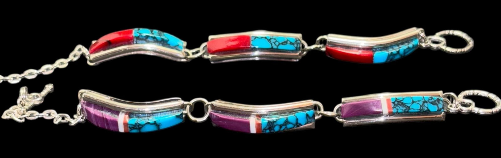 Pair of Native American Sterling, Turquoise and Coral Bracelets: Pair of sterling, turquoise and coral bracelets. One is very well marked NEZ. Other is weakly marked. NEZ is a family of award-winning Navajo silversmiths. Lovely pieces. For in-house shipping, select