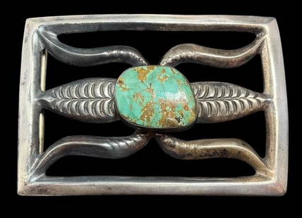 Vintage Native American Navajo Sand Cast Belt Buckle: Vintage Native American Navajo sand cast "corn" belt buckle. Tested sterling. Measures 3" x 2" and will accept a belt 1.75" in width. For in-house shipping, select "bidder arranged". Domestic shipping