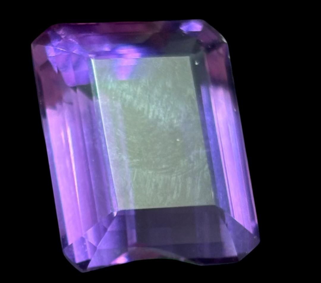 Polished Amethyst Stone: Polished amethyst stone. Weighs 6.7g and measures 1" x .5" x .25". For in-house shipping, select "bidder arranged". Domestic shipping $6.