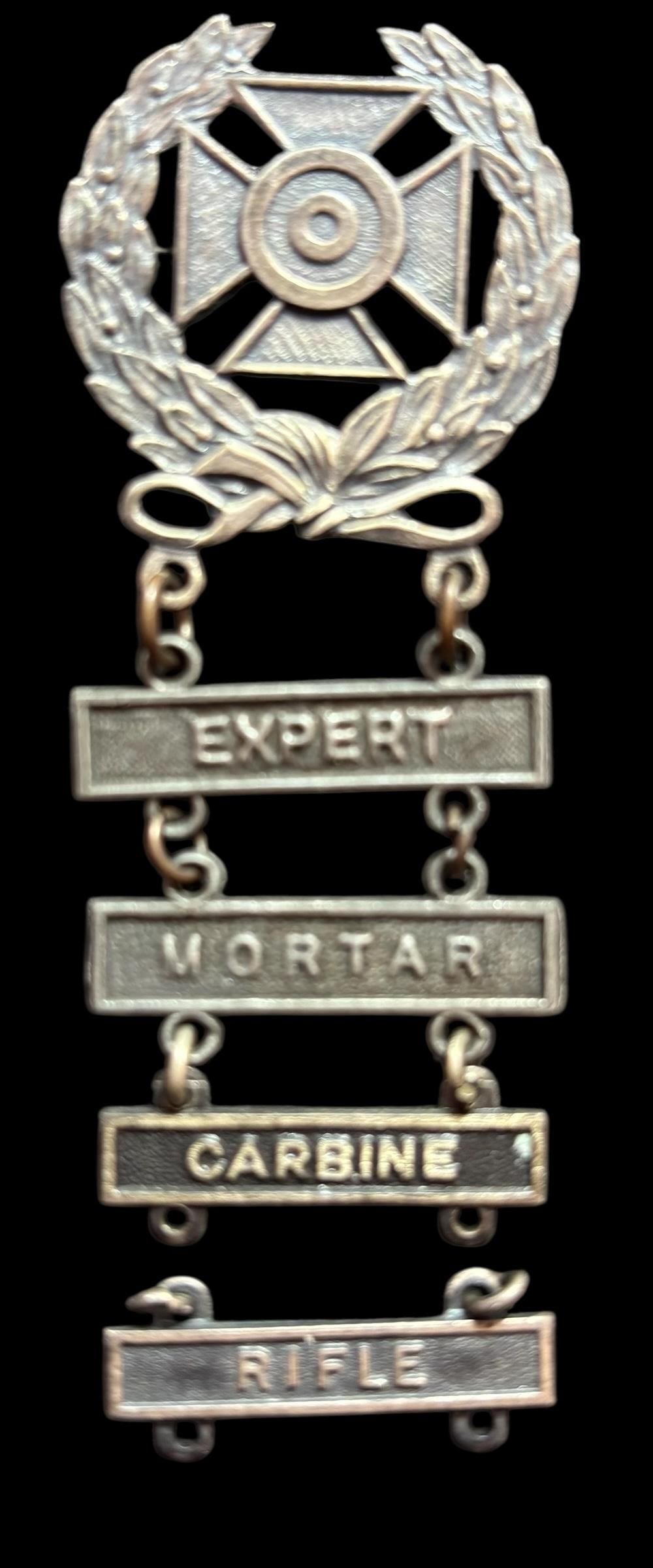 Lot of Five World War ll Qualification Badges Sterling: Lot of five Military World War II Qualification badges. All marked sterling. Expert, Mortar, Carbine and Rifle. For in-house shipping, select "bidder arranged". Domestic shipping $8.