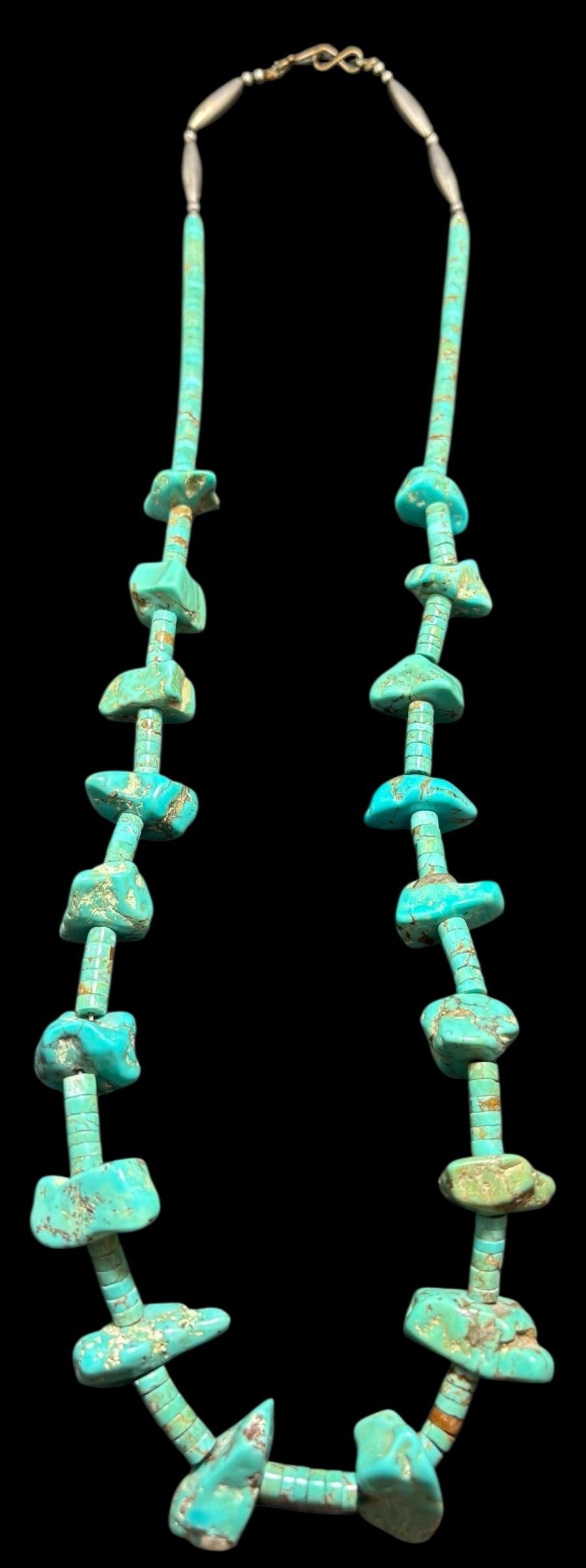 Native American Navajo Turquoise Nugget and Bead Necklace: Turquoise chunk and turquoise bead necklace with sterling beads and end spacers. Measures 26". For in-house shipping, select bidder arranged. Domestic shipping $12.