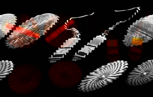 Three Pairs of Navajo Made Pierced Earrings: Three pair of sterling Navajo pierced earrings. Inlaid coral pair measures 7/8", sterling concho style measures .75", dangle pair signed W inlaid onyx and tiger's eye measures .75".
