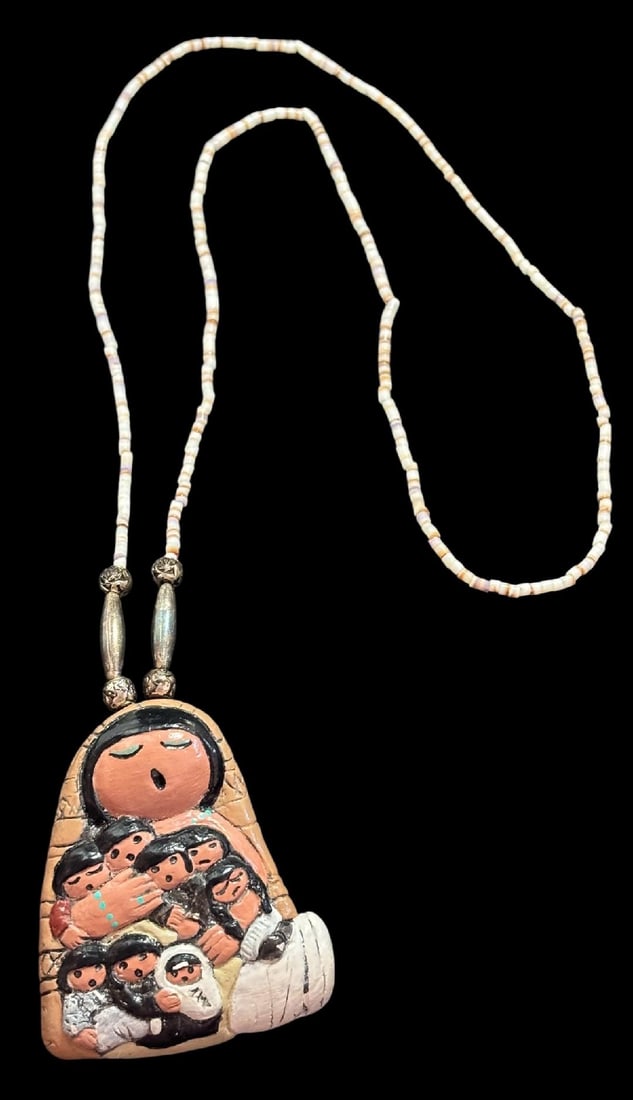 Native American Signed Storyteller Pendant Necklace SIgned CM Renner: Native American storyteller pendant necklace. Signed CM Renner. Necklace measures 24" with a 2" x 2.5" pendant.