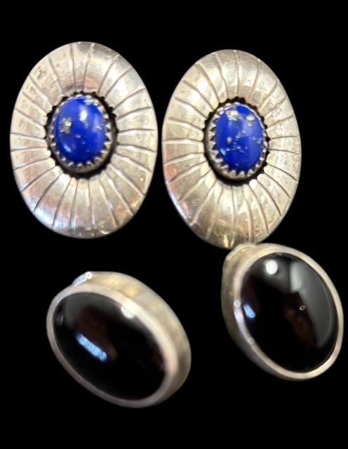 Pair of Native American Navajo Sterling and Stone Earrings Signed JT: Pair of Native American Navajo sterling and stone pierced earrings. 1) Sterling and lapis stone measuring .75" x 1". Marked sterling and signed P. 2) Sterling and onyx stone earrings. Signed JT and me