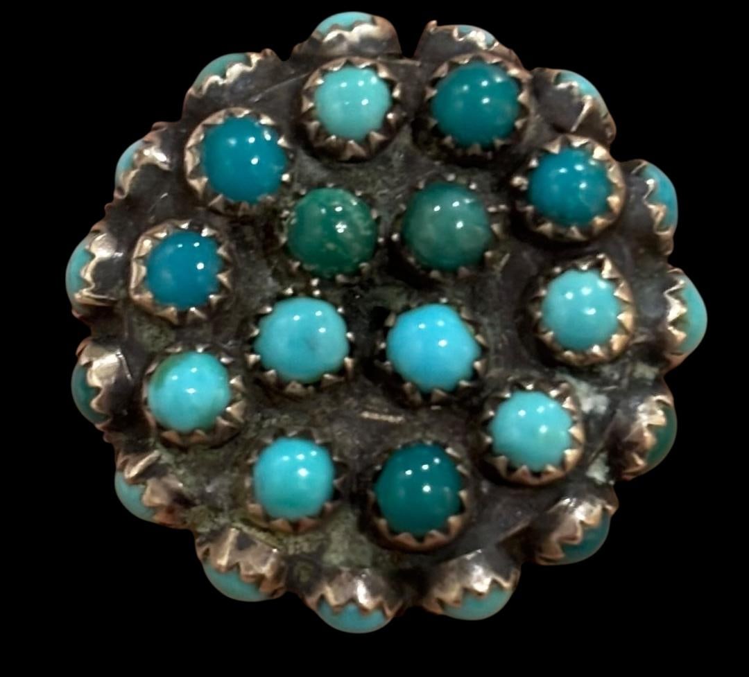 Native American Silver and Turquoise Ring with Turquoise Around Edges: Native American silver and turquoise ring Size 8.75 and measures .75" diameter. Unsigned.