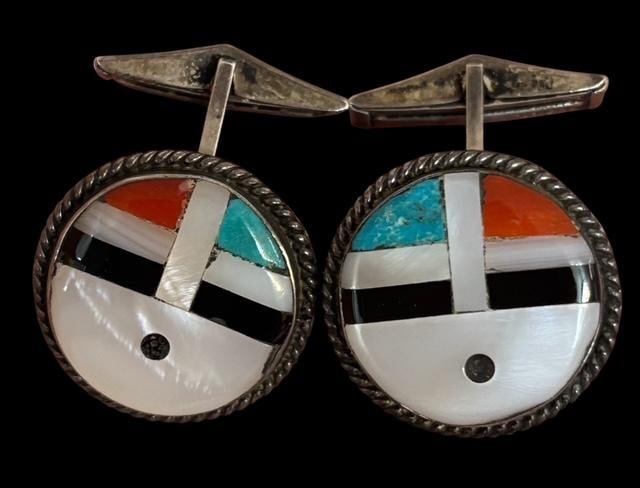 Native American Zuni Sterling and Stone Cuff Links: Native American Zuni sterling cuff links with mother of pearl, turquoise, coral and onyx inlay. Measure .75" curcumference. Unsigned.