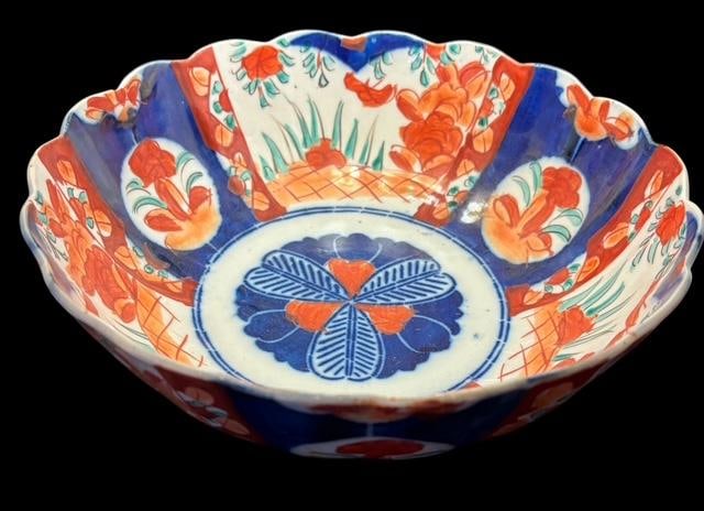 Antique Hand Painted Japanese Imari Bowl with Scalloped Edge: Japanese Imari bowl with scalloped edge in blue and orange. Unsigned/unmarked. Measures 9.5" x 4".
