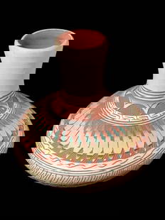 Native American Navajo Vase-Signed Hilda Whitegoat: Native American Navajo vase. Signed Hilda Whitegoat. Measures 5.5" tall by 6" wide. Nice feather design and coloration.