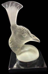 Antique Lalique Peacock Hood Ornament: Antique Lalique peacock hood ornament. Signed R. Lalique/France on base. Often found on luxury cars and known as "The Tete de Paon". Base measures 4"x4" with peacock height of 8". For in-house shippin