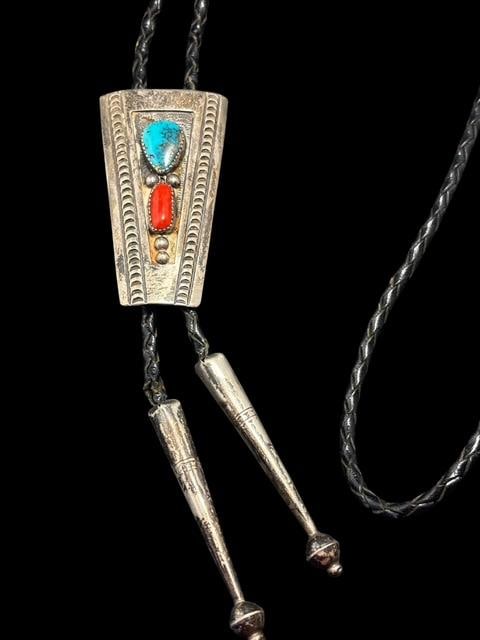 Signed LT Bolo Tie with Turquoise and Coral: Native American Bolo Tie, signed LT, sterling with turquoise and coral. 1.5" and 2.75" with 40" cord.