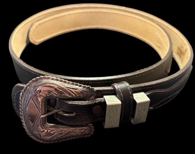 Tony Lama Leather Belt with Sterling RANGER Belt Buckle: Tony Lama leather belt with sterling belt buckle. Made in USA. Belt is a size 34. Buckle measures 2" x 2".