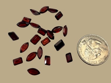 Lot of Twenty Two Cut and Polished Garnet Stones