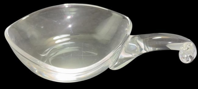 Signed Steuben Art Glass Decorative Bowl: Art glass crystal decorative bowl with handles. Signed Steuben. With handles measures 8.5" x 6" x 1.75".