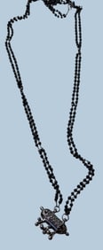 Middle Eastern Black Bead Necklace with Silver Pendant