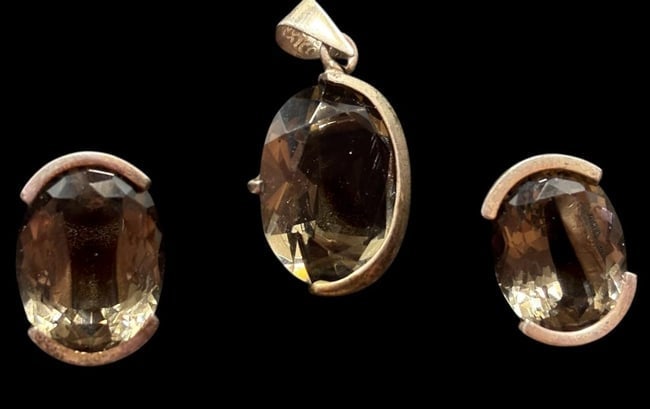 Taxco Sterling Set of Smokey Quartz Earrings with Matching Pendant: Taxco Mexico sterling and smokey quartz earrings and pendant. Marked Taxco sterling. Earrings measure fractionally different. 3/4" and 7/8" inch. Pendant measures 1.25".