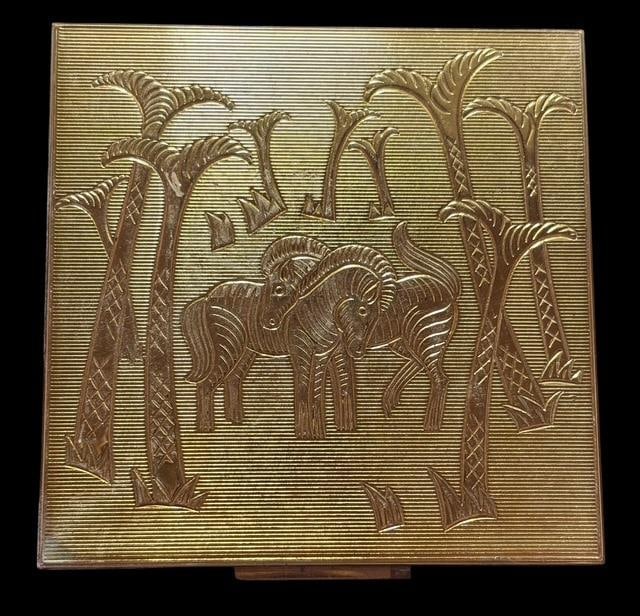 Vintage Elgin Zebra American Powder Compact ca 1940: Vintage Elgin American powder compact with mirror. Zebra motif on top. Some powder still in compact. Measures 2.75" x 2.75".