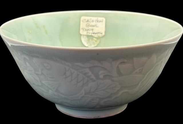 Rare Chinese Longquan Glazed Celadon Bowl ca 1450: Chinese Longquan Ming Dynasty (15th century) Celadon (green ware) bowl. Light green with a fish motif. Beautiful piece. Measures 3" tall x 6" diameter.