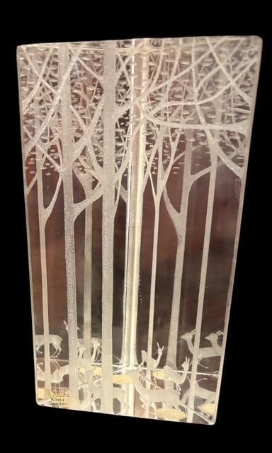 Kosta Boda Art Glass Prism Sculpture: Kosta Boda art glass three-sided prism sculpture. Etched forest scene. Panels measure 3.5" x 6.75". Paper label still affixed to panel.