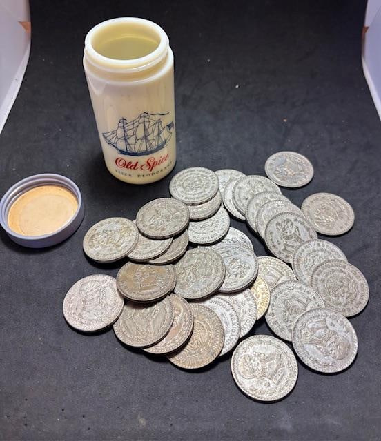 Lot of Mexican One Peso Siliver Coins: Lot of Mexican One Peso coins. 1957 - 4; 1958 - 2; 1959 - 9; 1960 - 6; 1961 - 4; 1962 - 7; 10% silver. Ungraded.