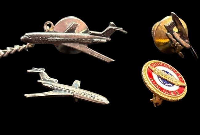 Lot of Four Airline Memorabilia Tie Tacks and Pin: Lot of four aviation memorabilia. Three tie tacks and one Northwestern Airlines Pin.