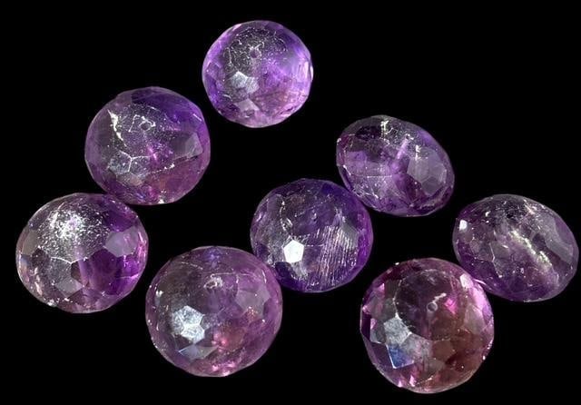 Lot of Eight Amethyst Faceted Round Beads: Lot of eight amethyst faceted round beads with holes for stringing. Approximately .75" x .75".