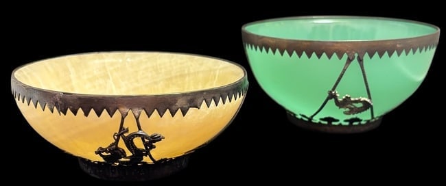 Pair of Chinese Temple White and Green Jadeite Bowls with Silver Dragons: Vintage Chinese white and green jade temple bowls. 1)sawtooth and dragon metal motif. Measures 4.5"x2.5". 2) Metal phoenix and sawtooth design. Stamped signature on bottom. Measures 4.25"x2".