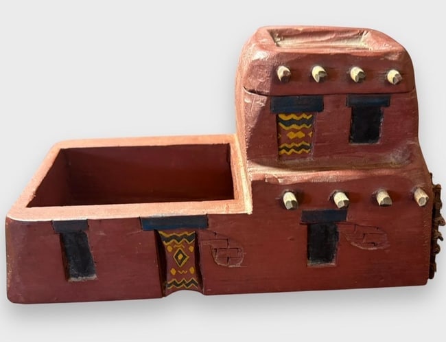 Native American Wooden Pueblo Adobe Taos, NM: Native American, adobe look, wooden house sculpture from Taos, NM area. Hand painted. Measures 7.5" x 4.5" x 3" Nice details. Signed KLYF on base.