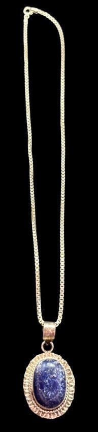 Lapis Pendant on Sterling Chain Necklace: Lapis pendant on sterling Italian chain. Chain is marked .925 and Italy and measures 17". Lapis pendant measures 1.75" x 1".