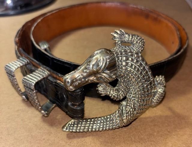 Alexander Alligator Belt and Sterling Belt Buckle: Alligator belt with a sterling belt buckle. Buckle by Alexander Belts and Buckles of Colorado. Buckle measures 3" x 2.75". Belt made by Black Jack Belts of genuine alligator. Measures 1.25" wide.