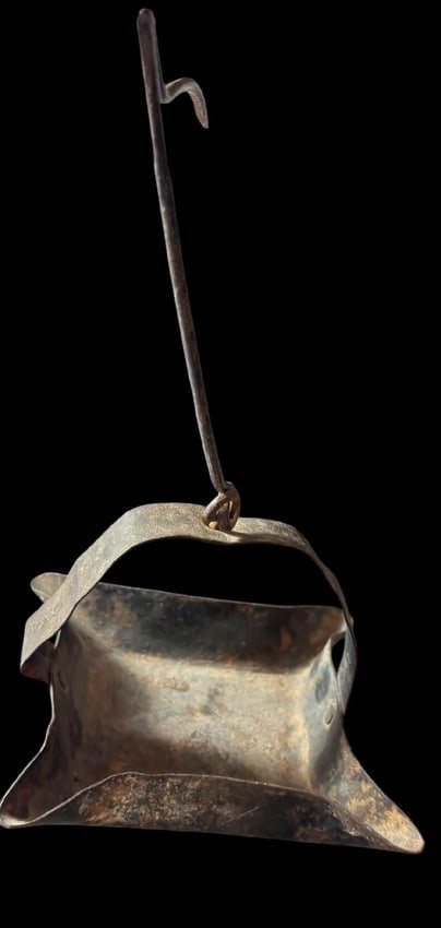 Antique Betty Lamp with Original Hook: Antique cast iron Betty lamp with original hook. Base measures 3.5". Hook to base measures 9". Nice antique piece.