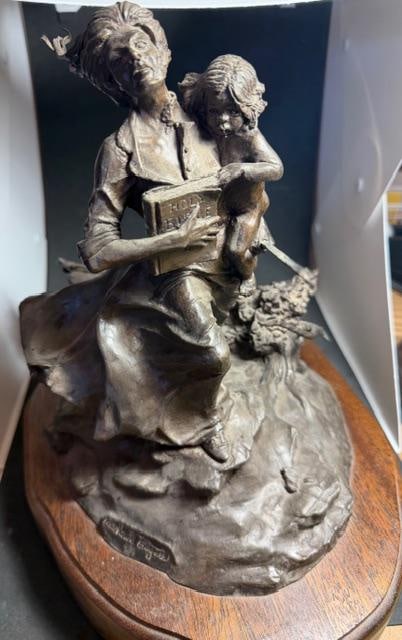 Limited Edition Signed Bronze Statue "The Lord is My Strength" Michael Boyett: Limited edition, 13/15, bronze statue on rotating wood base. Signed Michael Boyett and titled "The Lord is my strength. Psalm 118:14. Dated 1976. Measures 12"x9.5"x12".